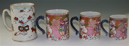 A graduated set of three Chinese export famille rose mugs and another larger, Qianlong period, 10cm-13cm and 16.5cm (4)